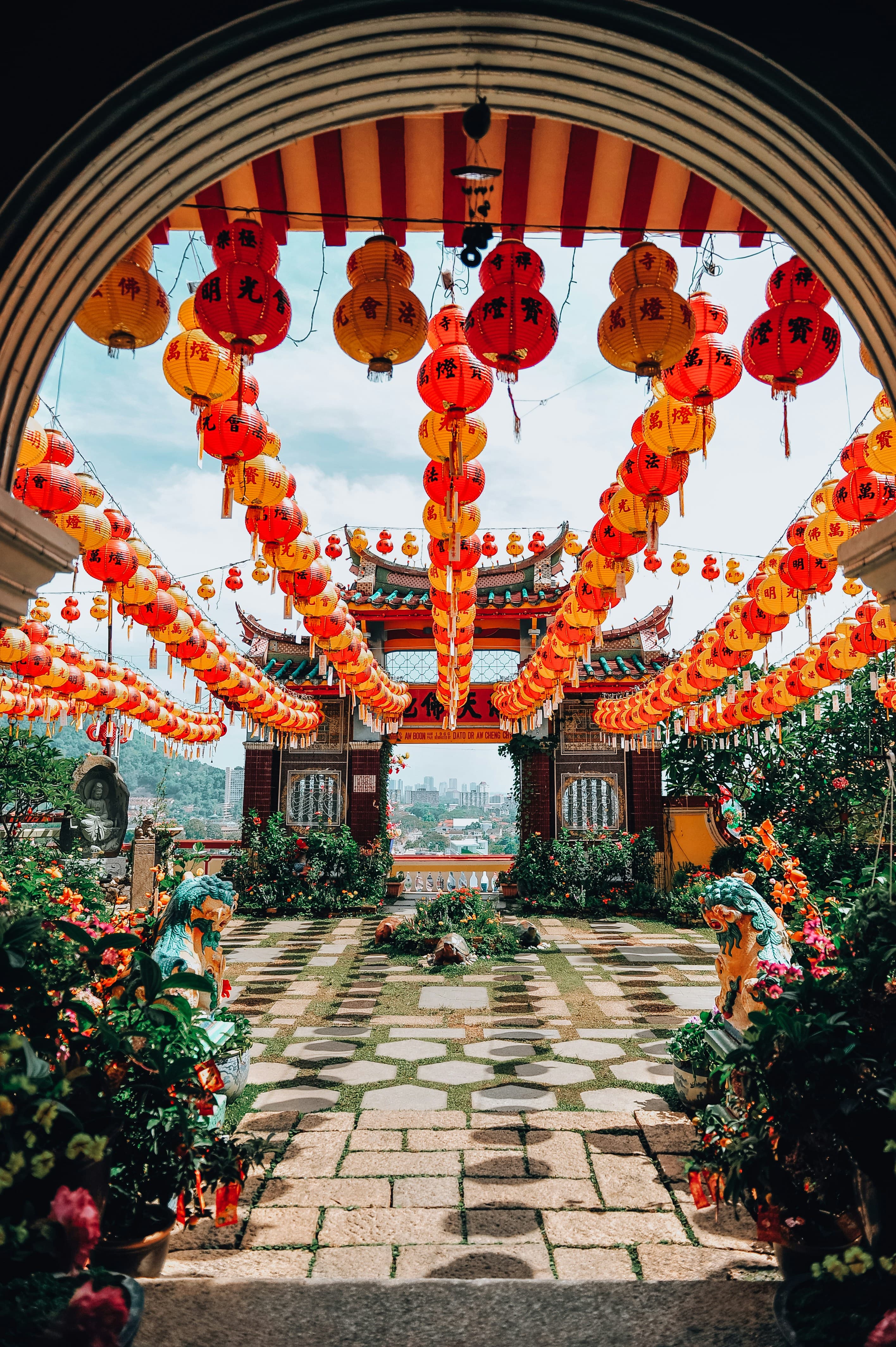 A lantern-lit temple archway celebrating Chinese heritage